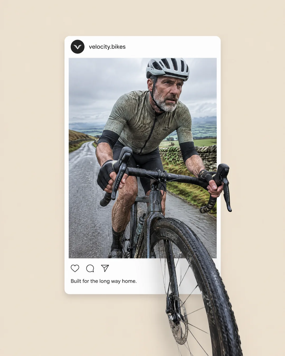 Velocity Bikes, Instagram ad: a grey-bearded cyclist climbs a wet country road, his front wheel rolling out of the post frame